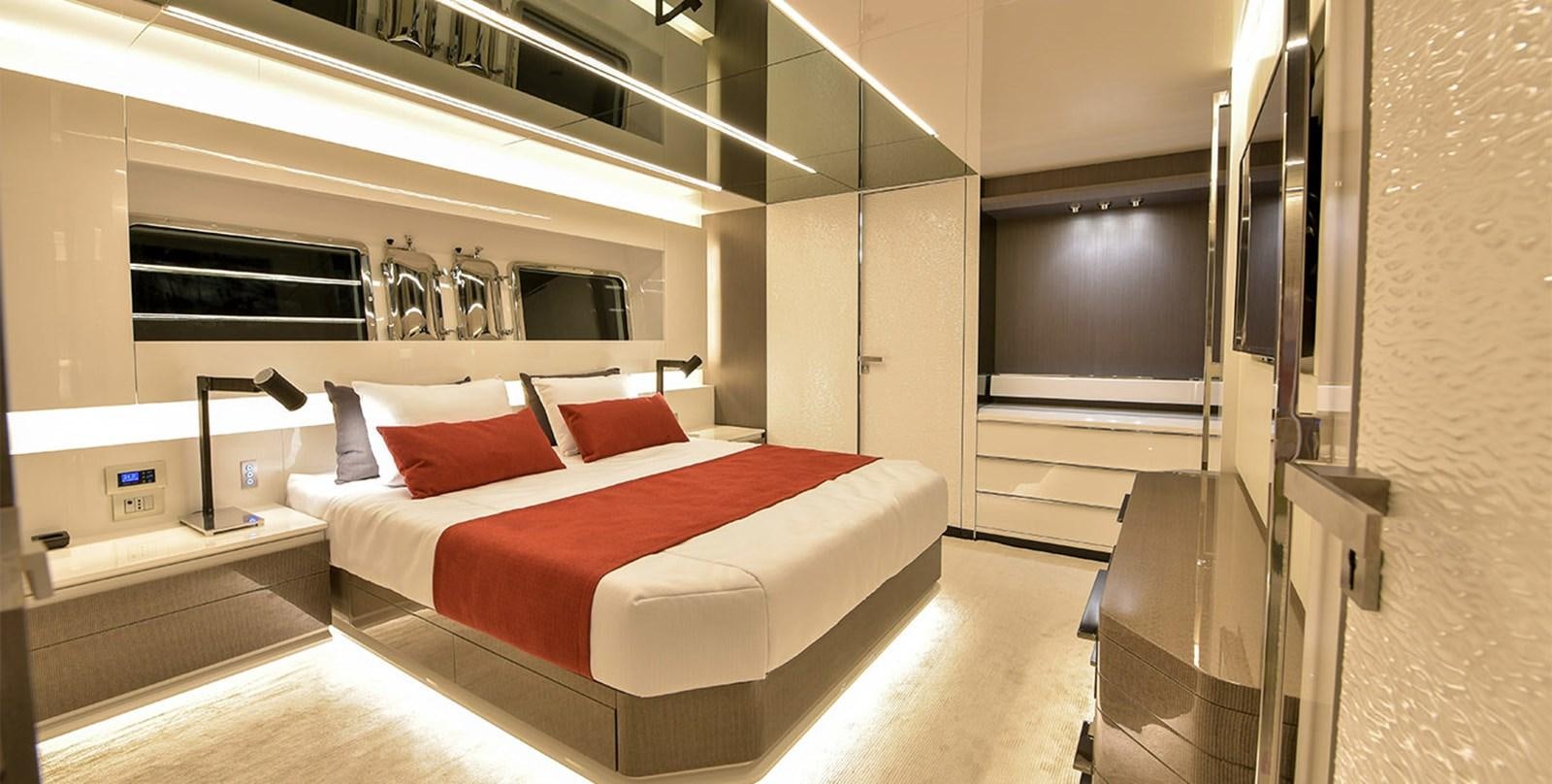 a room with a bed and a desk aboard ARIA.S Yacht for Sale