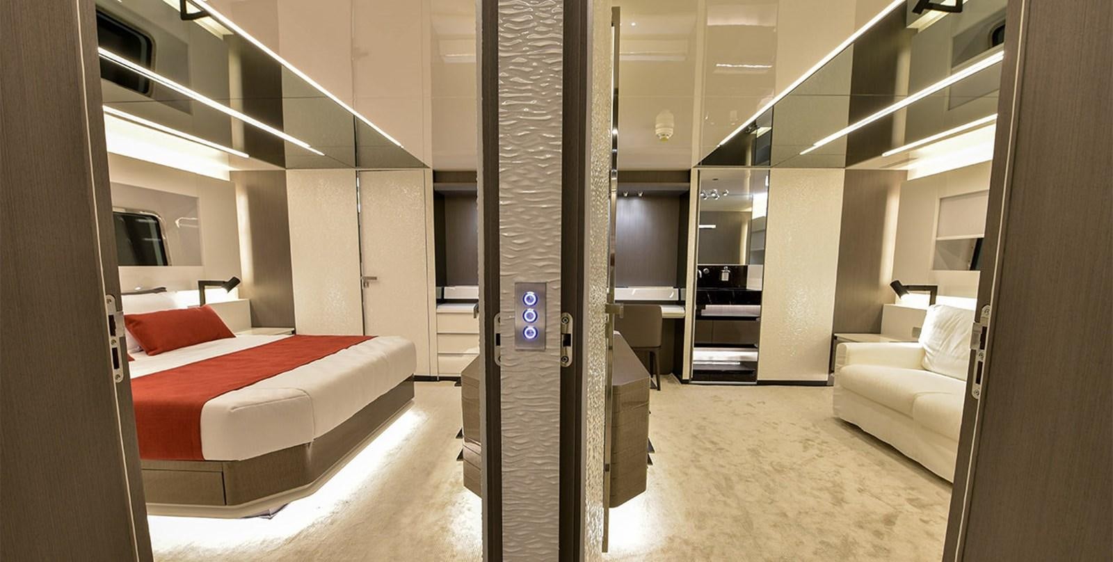 a room with a bed and a staircase aboard ARIA.S Yacht for Sale