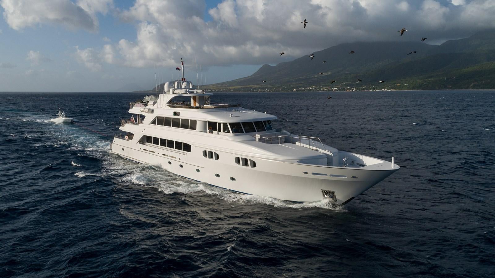 a white yacht on the water aboard REVIVE Yacht for Sale