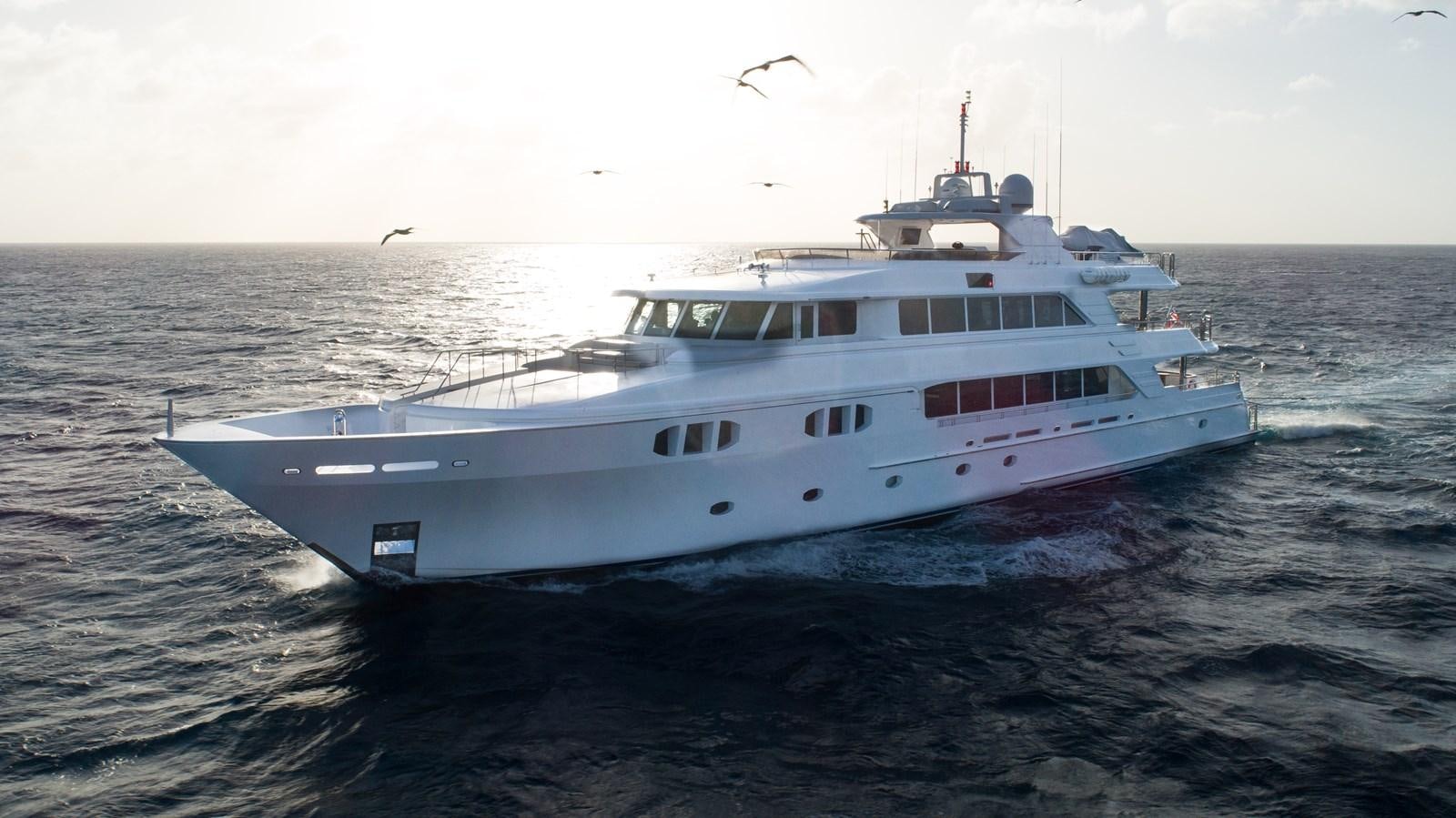 a large white boat in the water aboard REVIVE Yacht for Sale