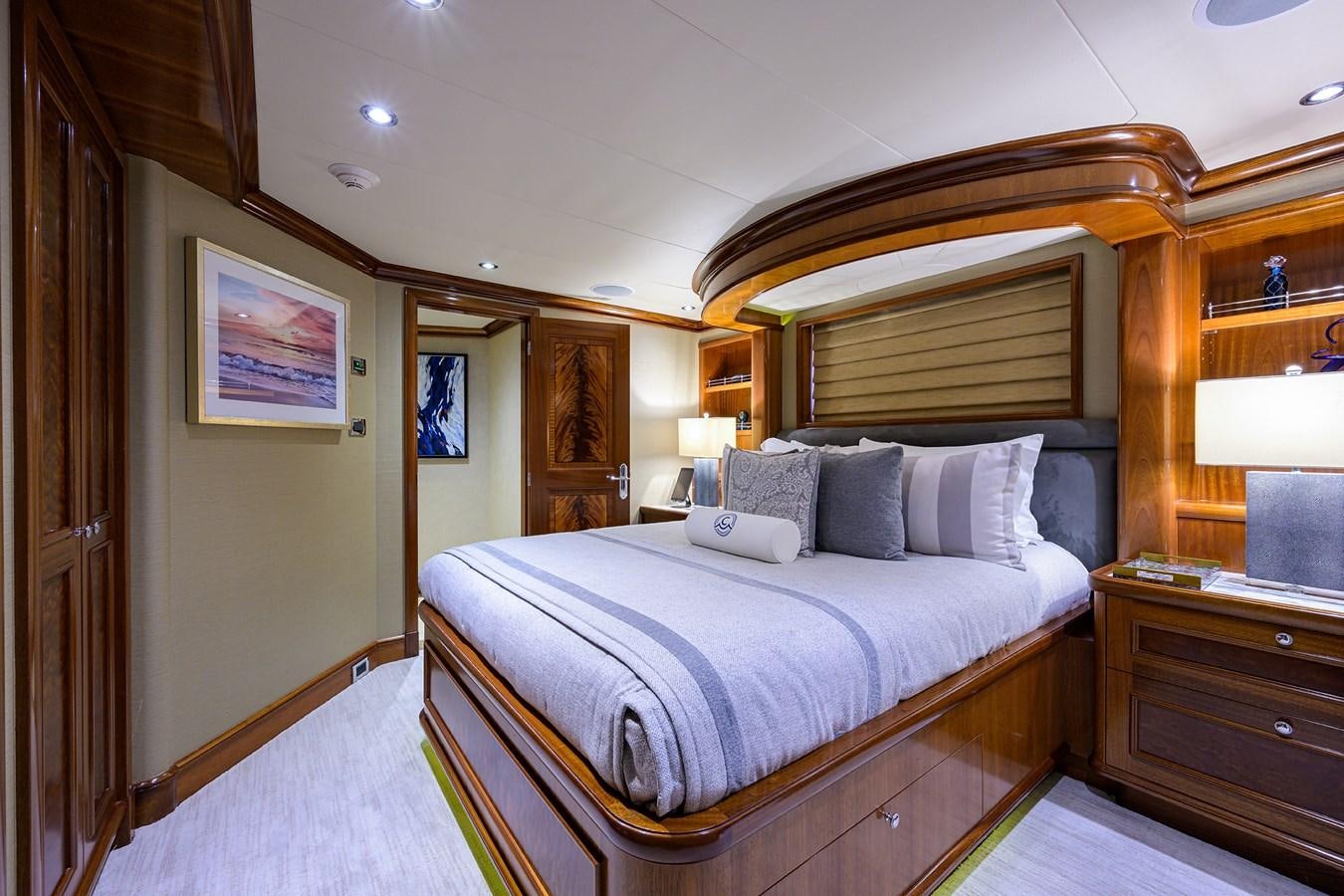 a bed in a room aboard REVIVE Yacht for Sale