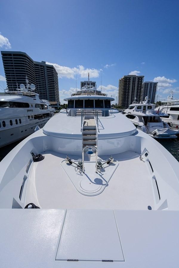 a white boat with a rope attached to it aboard REVIVE Yacht for Sale