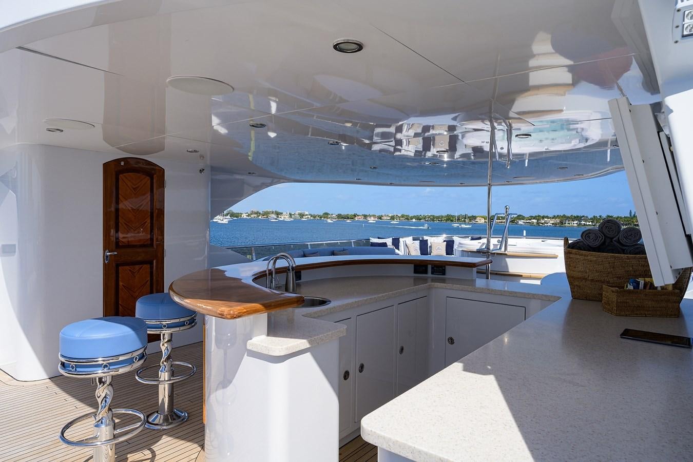 a large kitchen with a view of the ocean aboard REVIVE Yacht for Sale