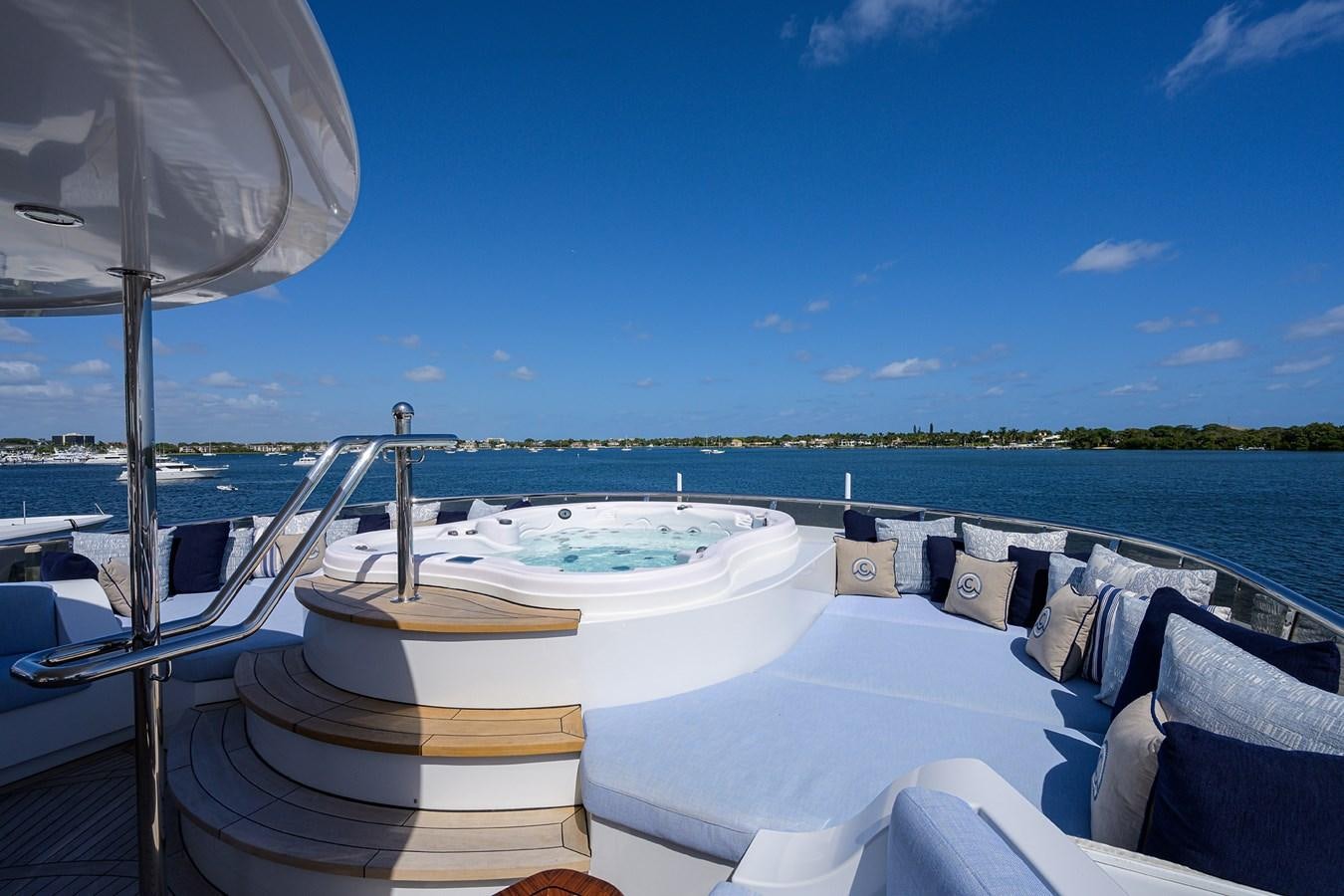 a boat on a water body aboard REVIVE Yacht for Sale