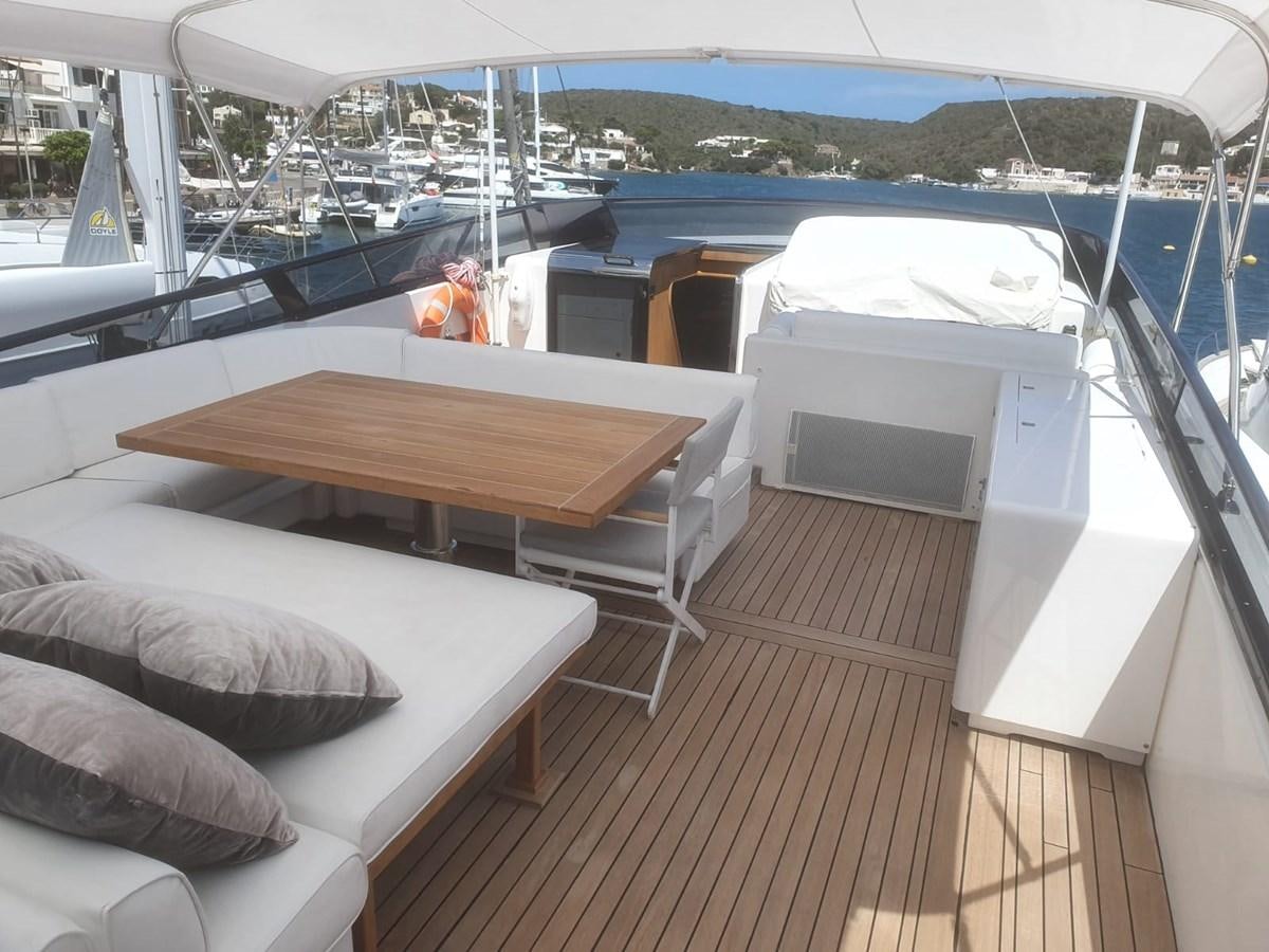 a boat on a deck aboard P Yacht for Sale