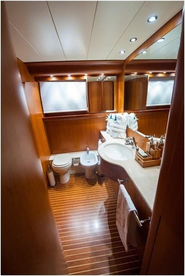 a bathroom with a sink and a toilet aboard P Yacht for Sale