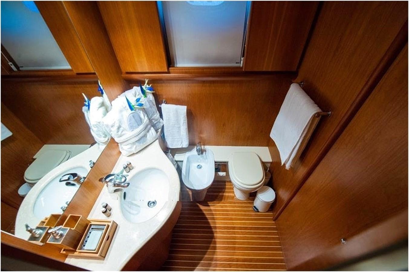 a bathroom with a sink and a toilet aboard P Yacht for Sale