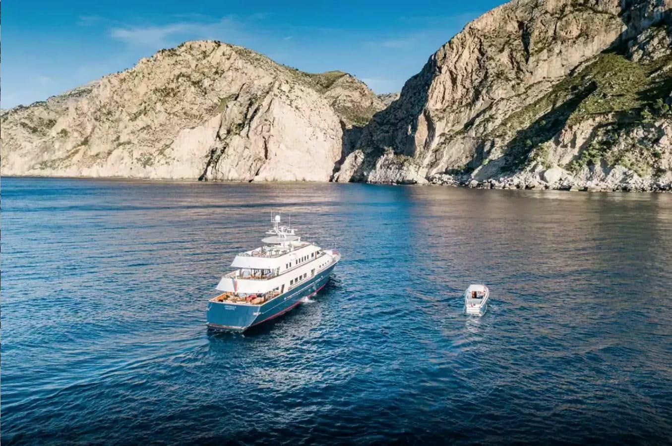 a boat sailing in the sea aboard CHARISMA Yacht for Sale