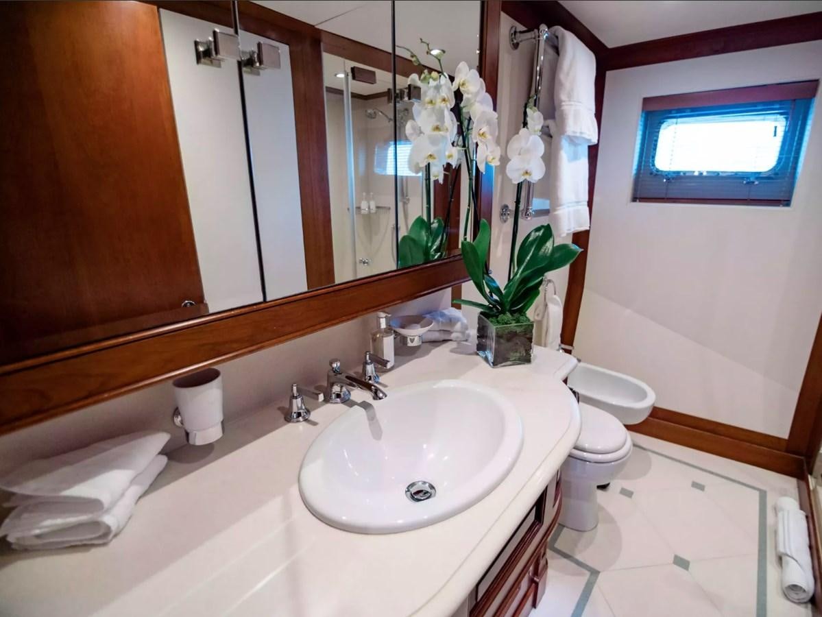 a bathroom with a sink and toilet aboard CHARISMA Yacht for Sale