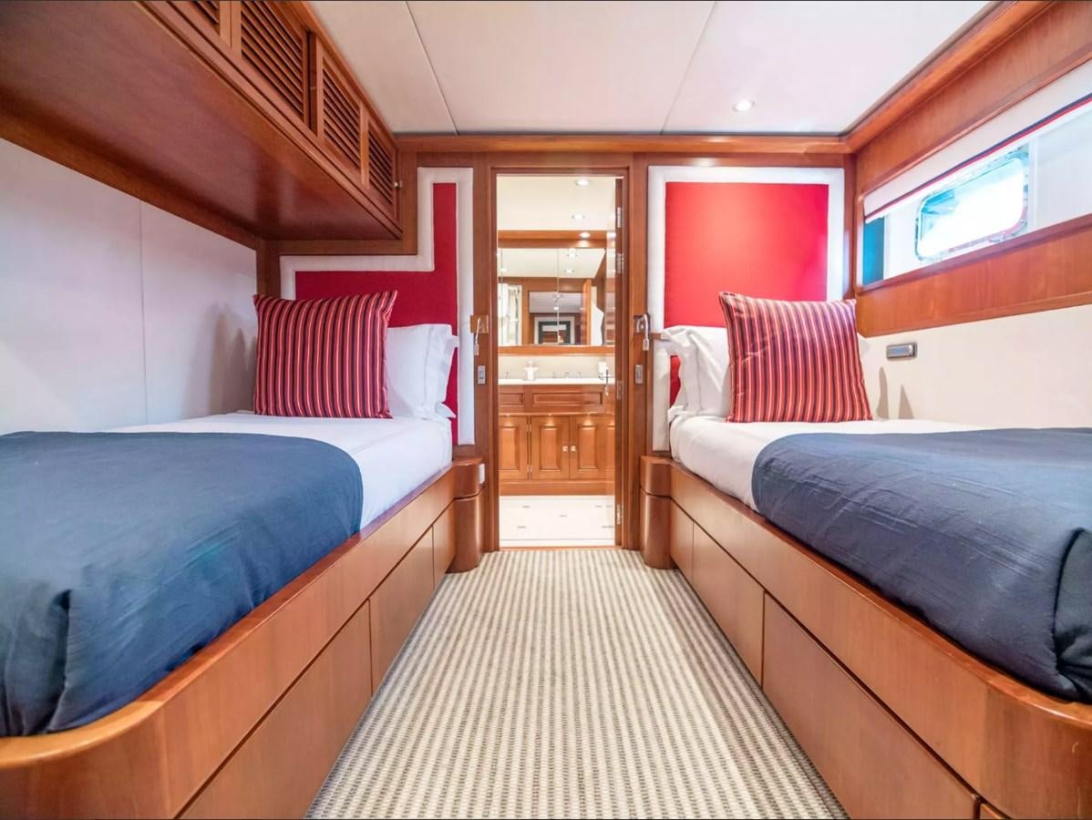 a couple of beds in a room aboard CHARISMA Yacht for Sale
