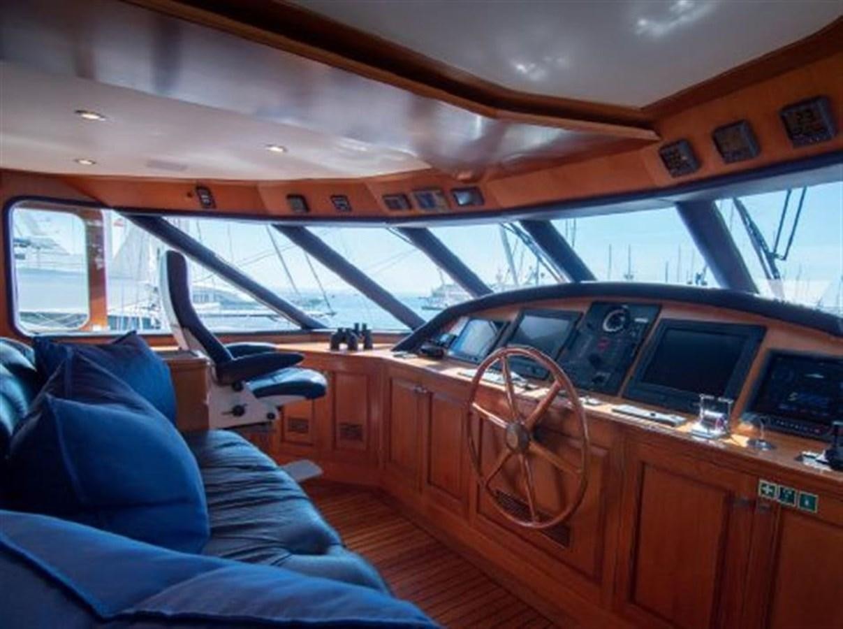a car with a steering wheel aboard CHARISMA Yacht for Sale