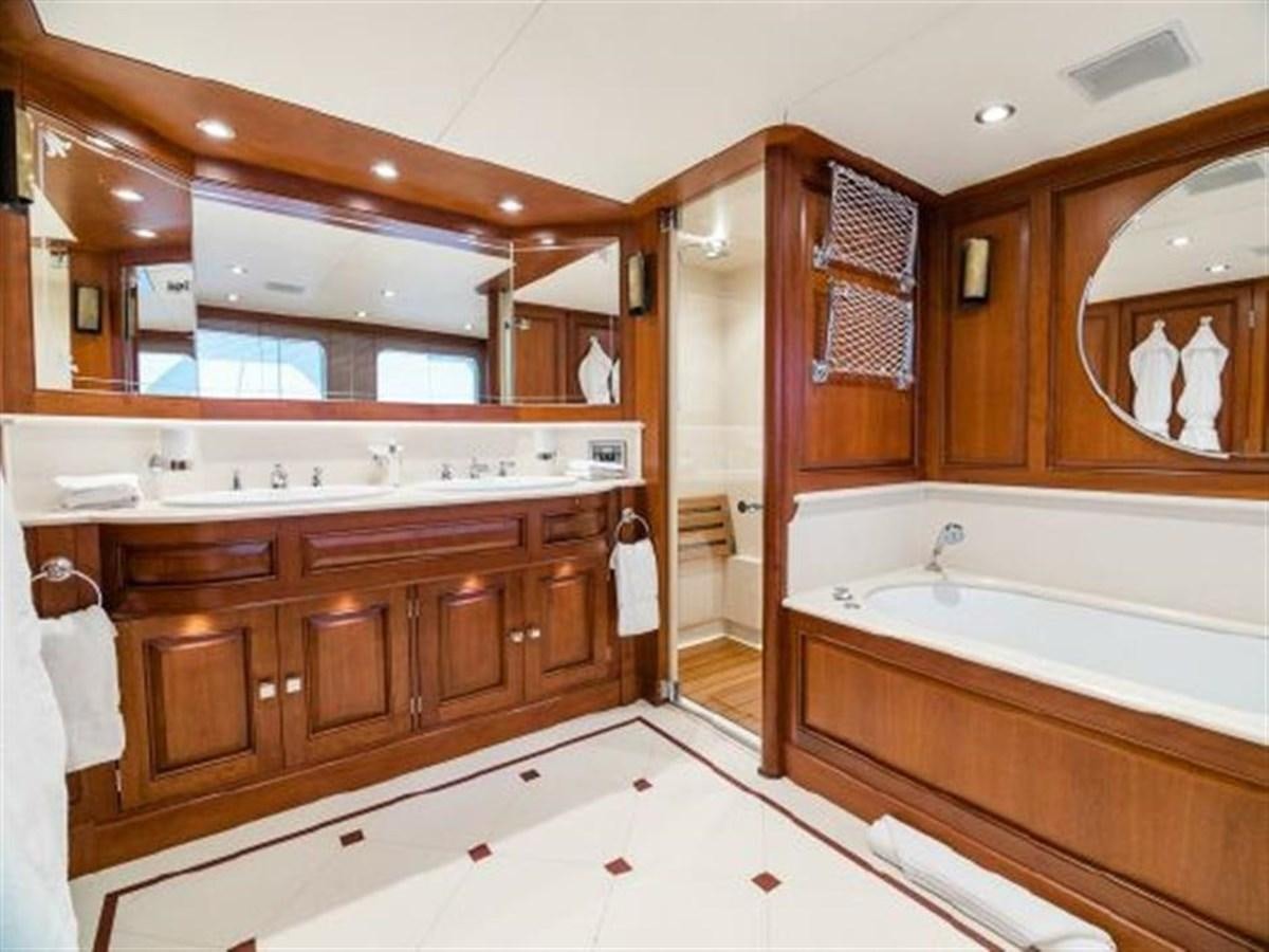 a bathroom with a large tub aboard CHARISMA Yacht for Sale