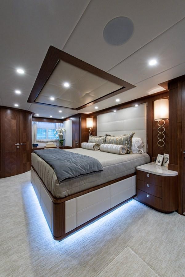 a bed in a room aboard G120 SIGNATURE SERIES Yacht for Sale