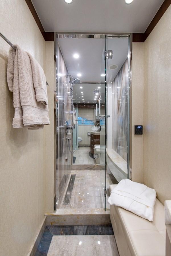 a bathroom with a large mirror aboard G120 SIGNATURE SERIES Yacht for Sale