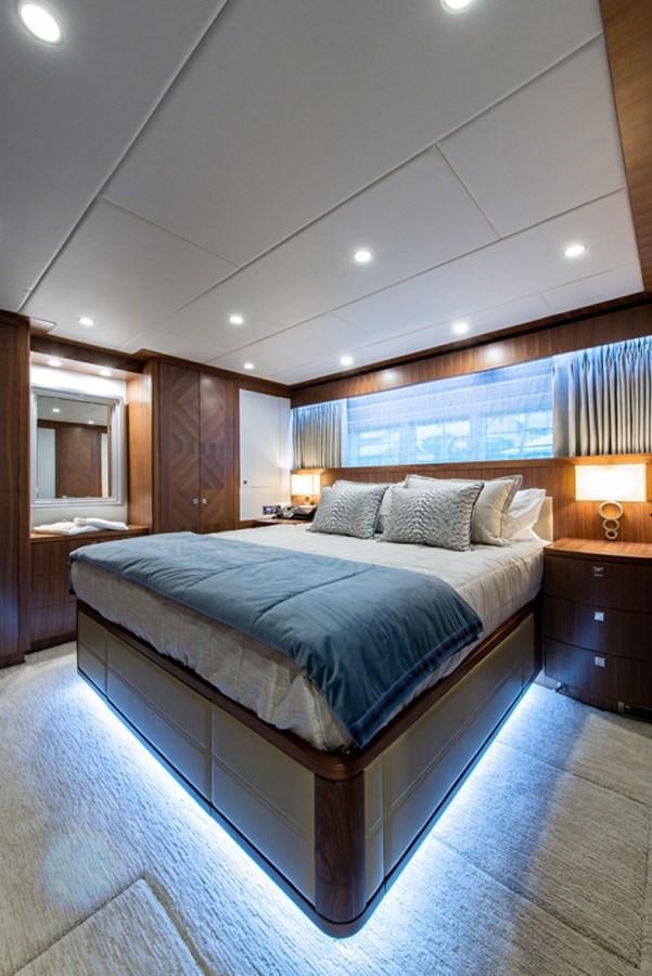 a bedroom with a large bed aboard G120 SIGNATURE SERIES Yacht for Sale