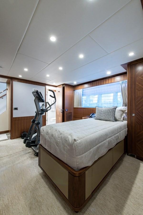 a bedroom with a bed and a ladder aboard G120 SIGNATURE SERIES Yacht for Sale