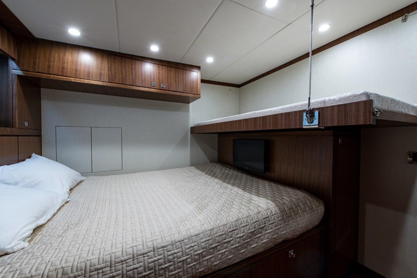 a bed with white sheets aboard G120 SIGNATURE SERIES Yacht for Sale