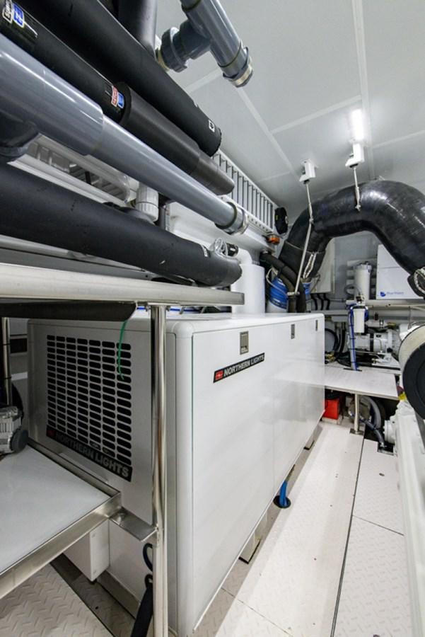 a machine in a room aboard G120 SIGNATURE SERIES Yacht for Sale