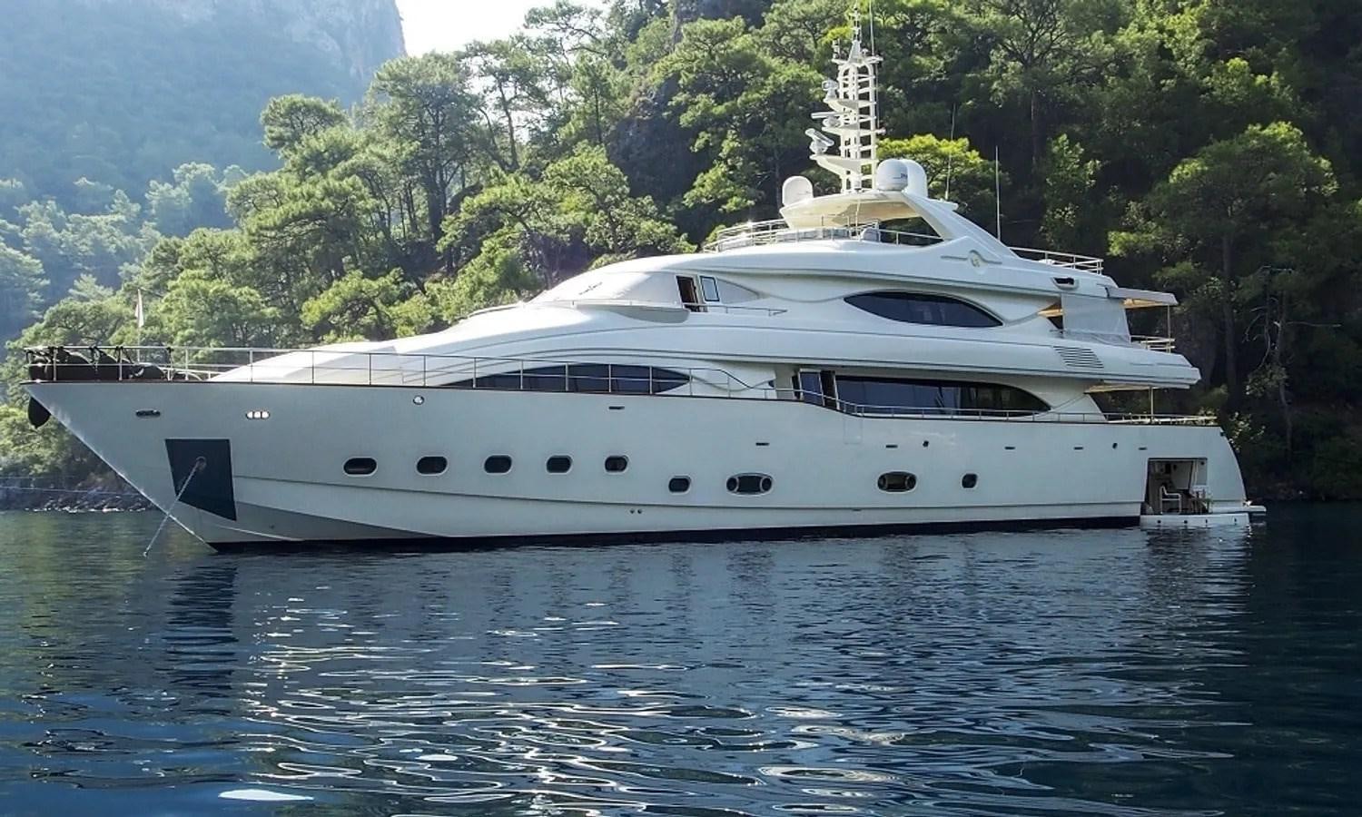 a white yacht on water aboard ARIELA Yacht for Sale