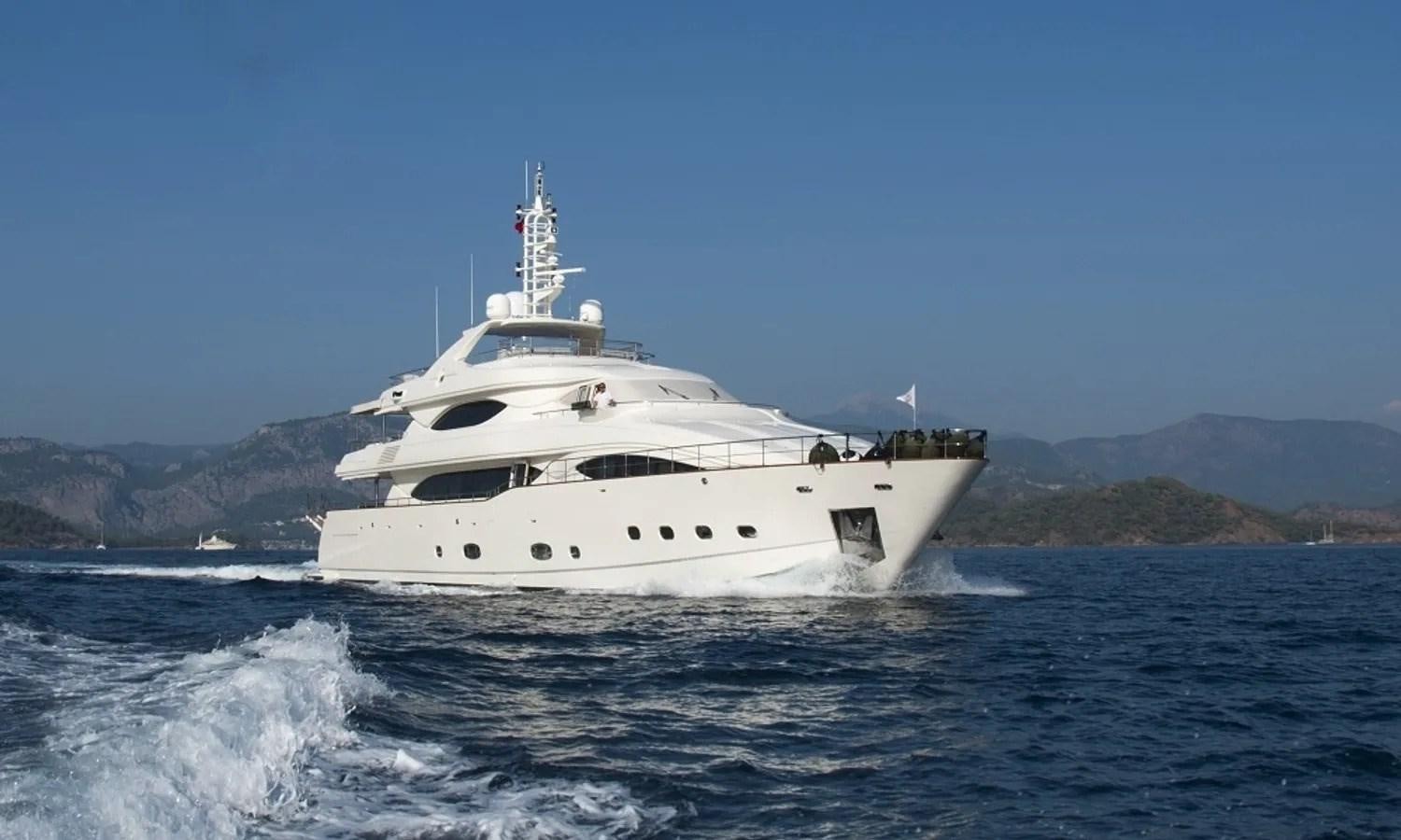 a white yacht on the water aboard ARIELA Yacht for Sale