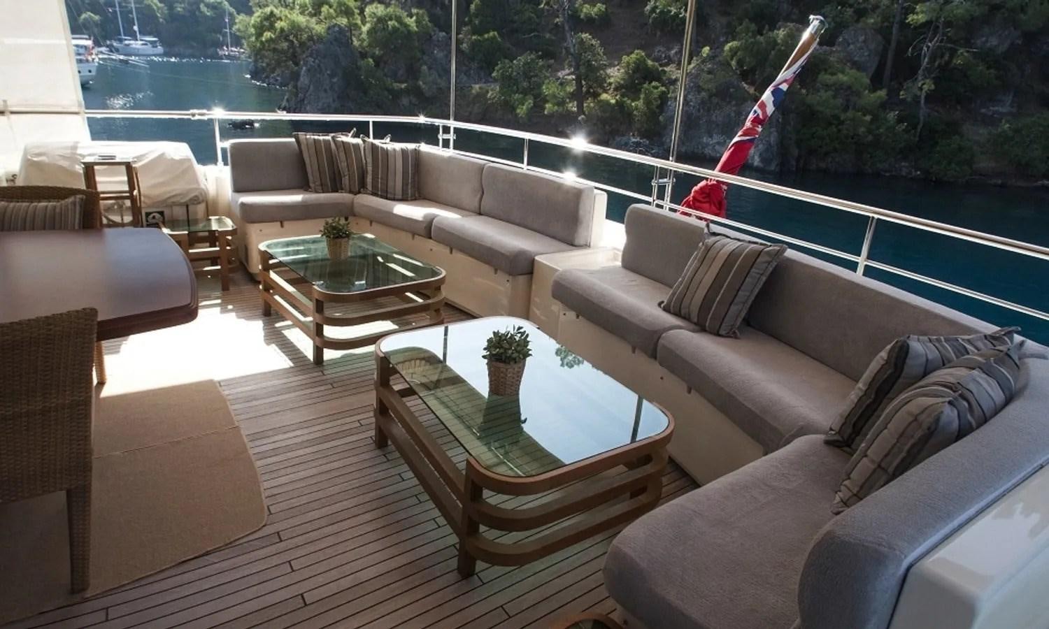 a living room with a large window aboard ARIELA Yacht for Sale