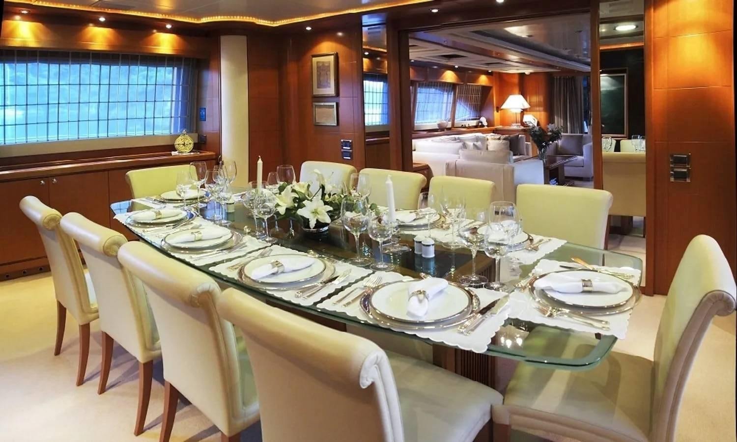 a table set for a dinner aboard ARIELA Yacht for Sale