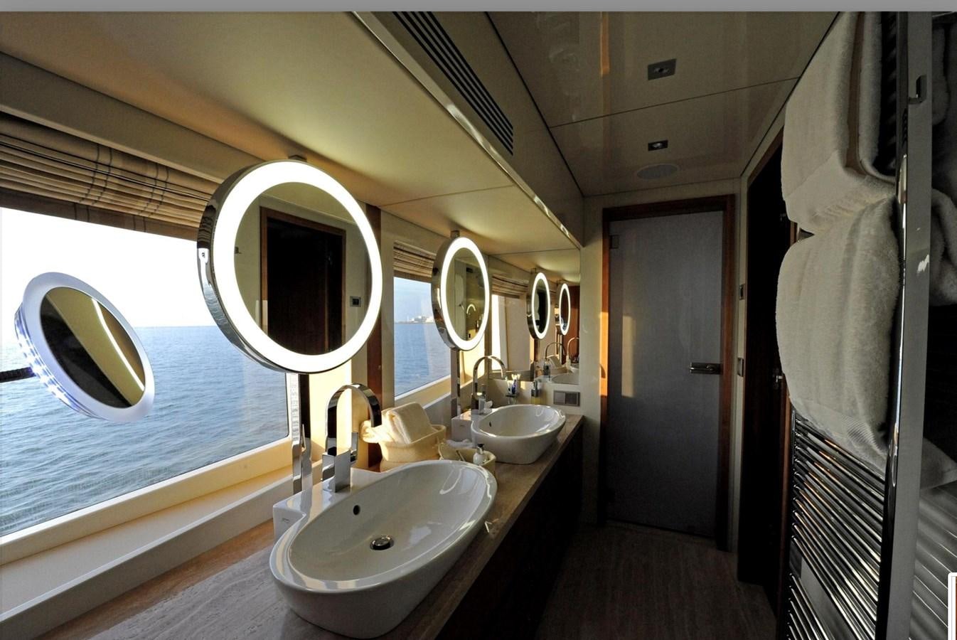 a bathroom with two sinks aboard BASMALINA II Yacht for Sale