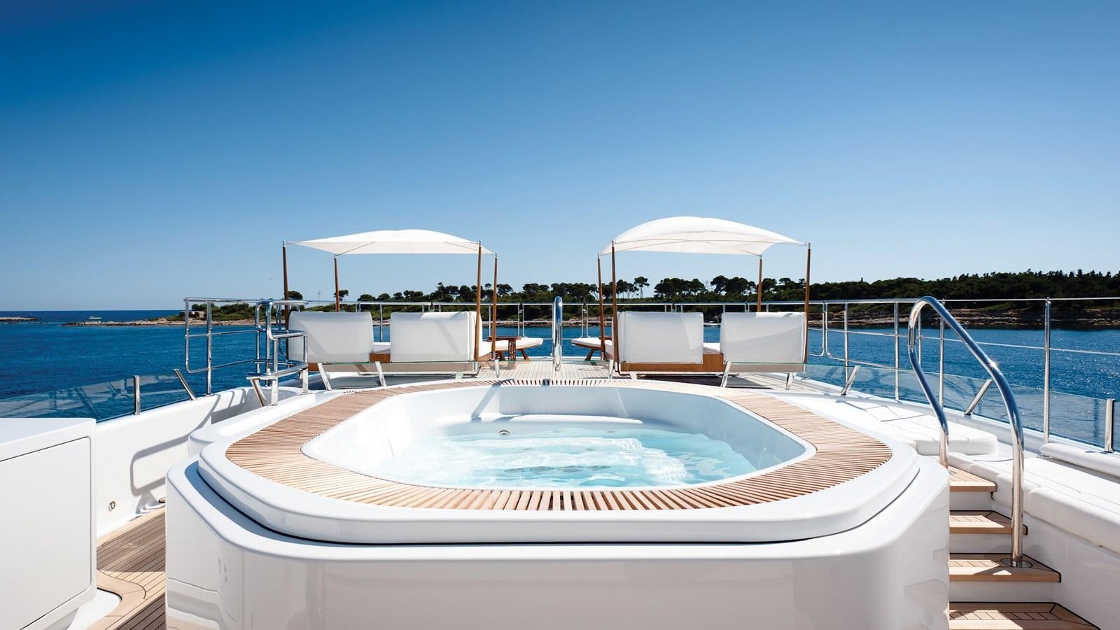 a swimming pool on a deck aboard STEP ONE Yacht for Sale