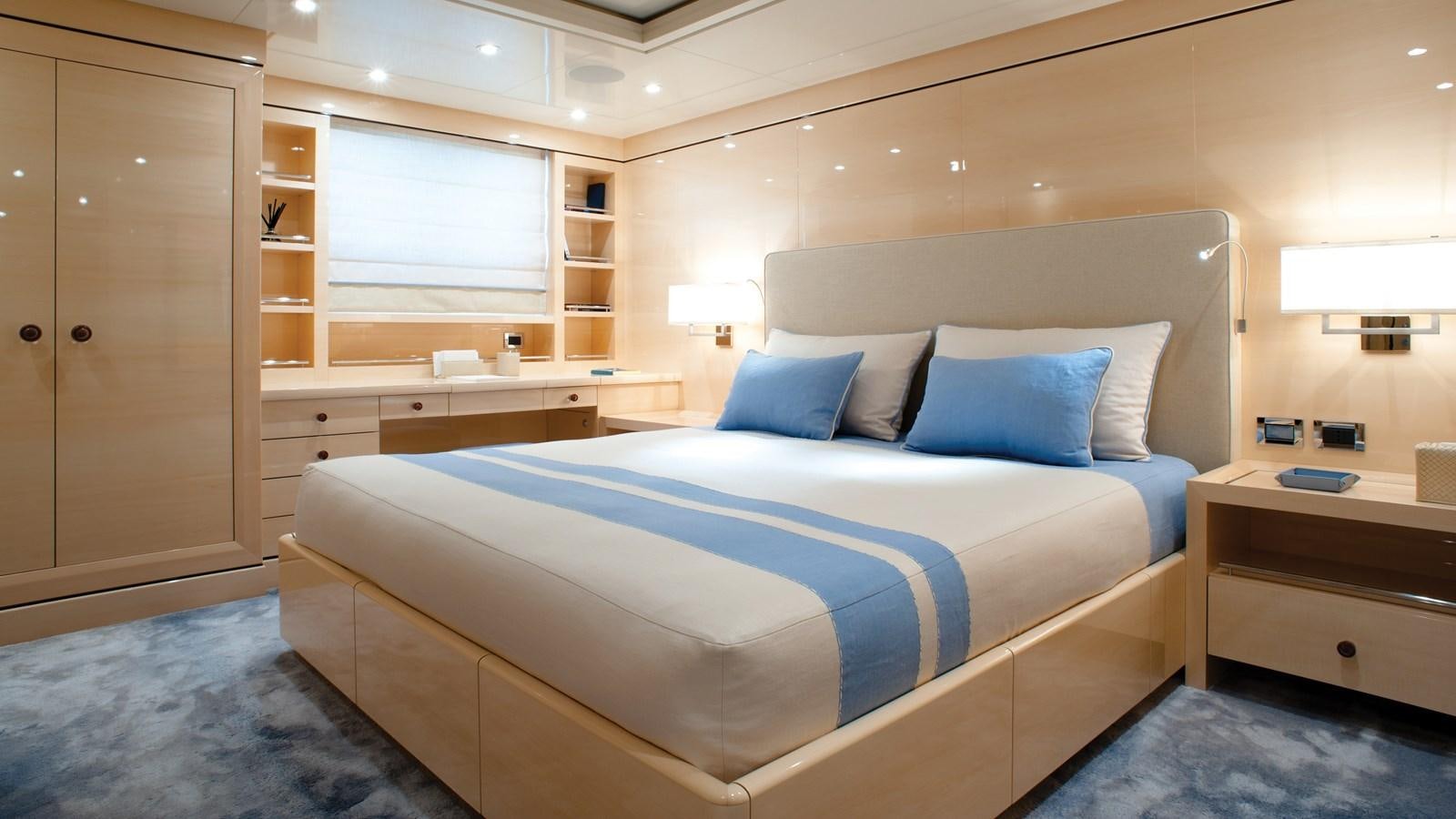 a bed in a room aboard STEP ONE Yacht for Sale