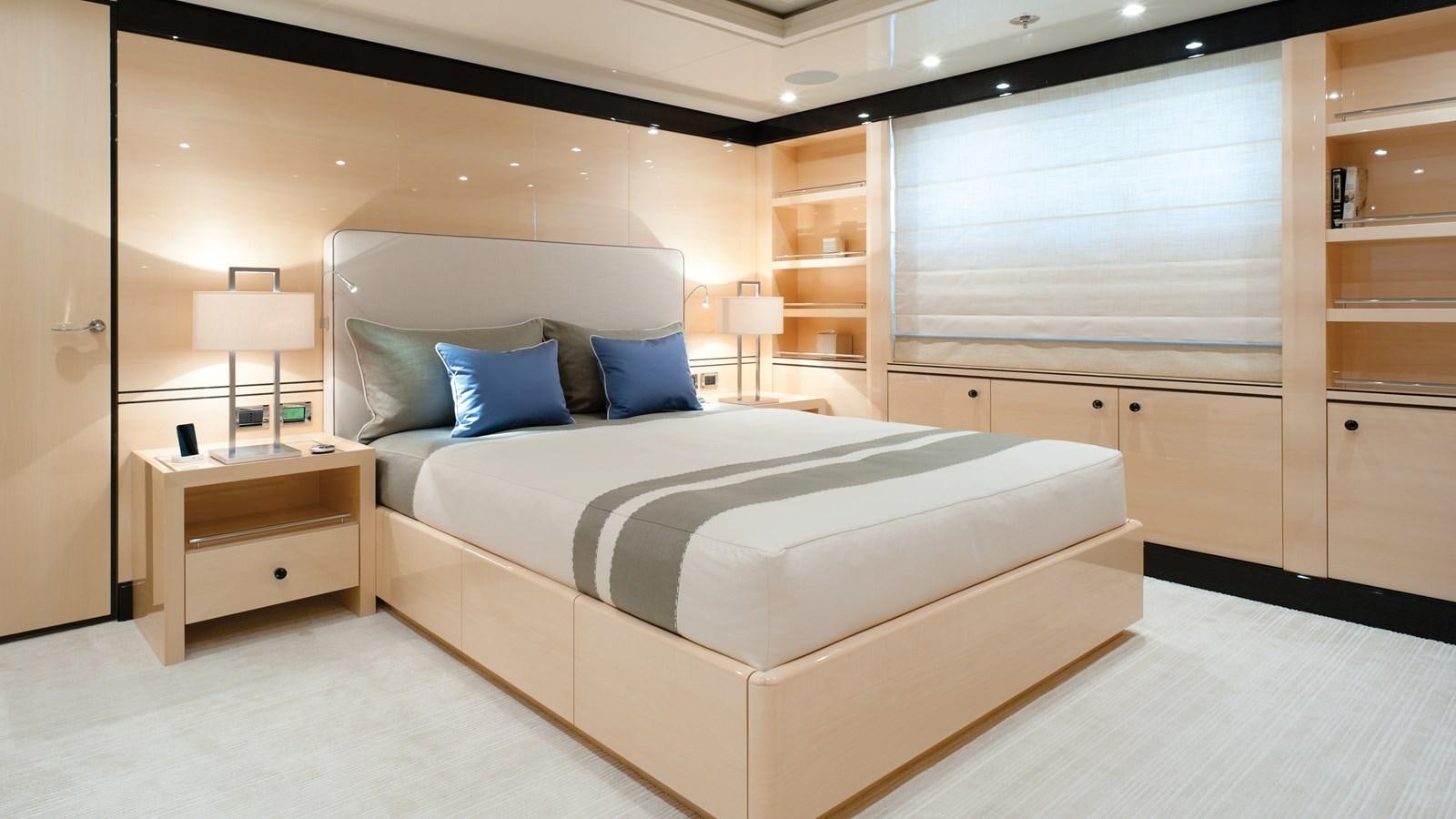 a bed in a room aboard STEP ONE Yacht for Sale