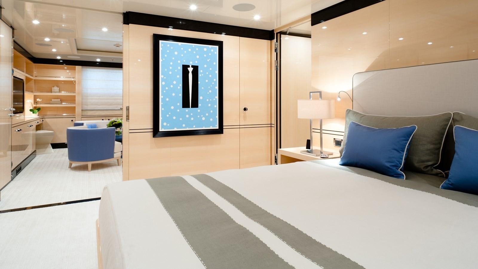a large bedroom with a large bed aboard STEP ONE Yacht for Sale