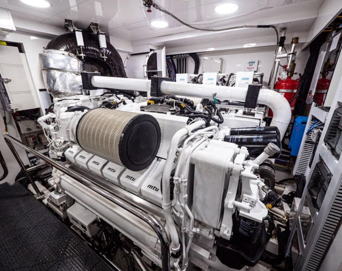 a large machine in a room aboard PHOENIX Yacht for Sale
