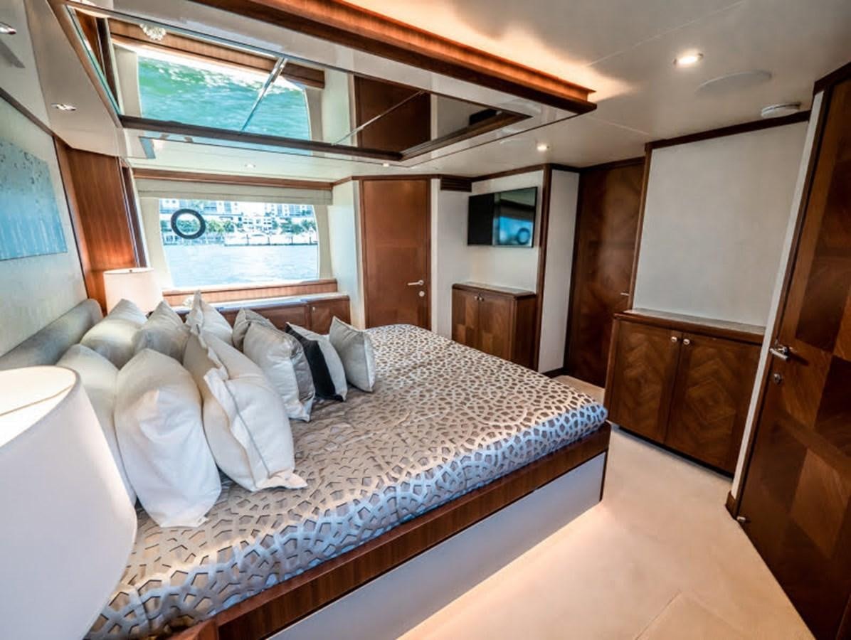 a bed in a room aboard PHOENIX Yacht for Sale