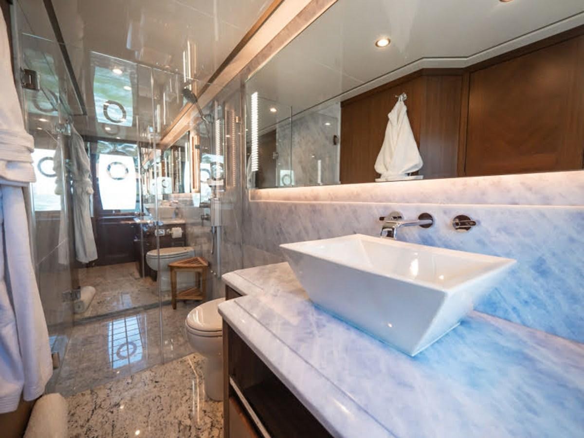 a bathroom with a large bathtub aboard PHOENIX Yacht for Sale