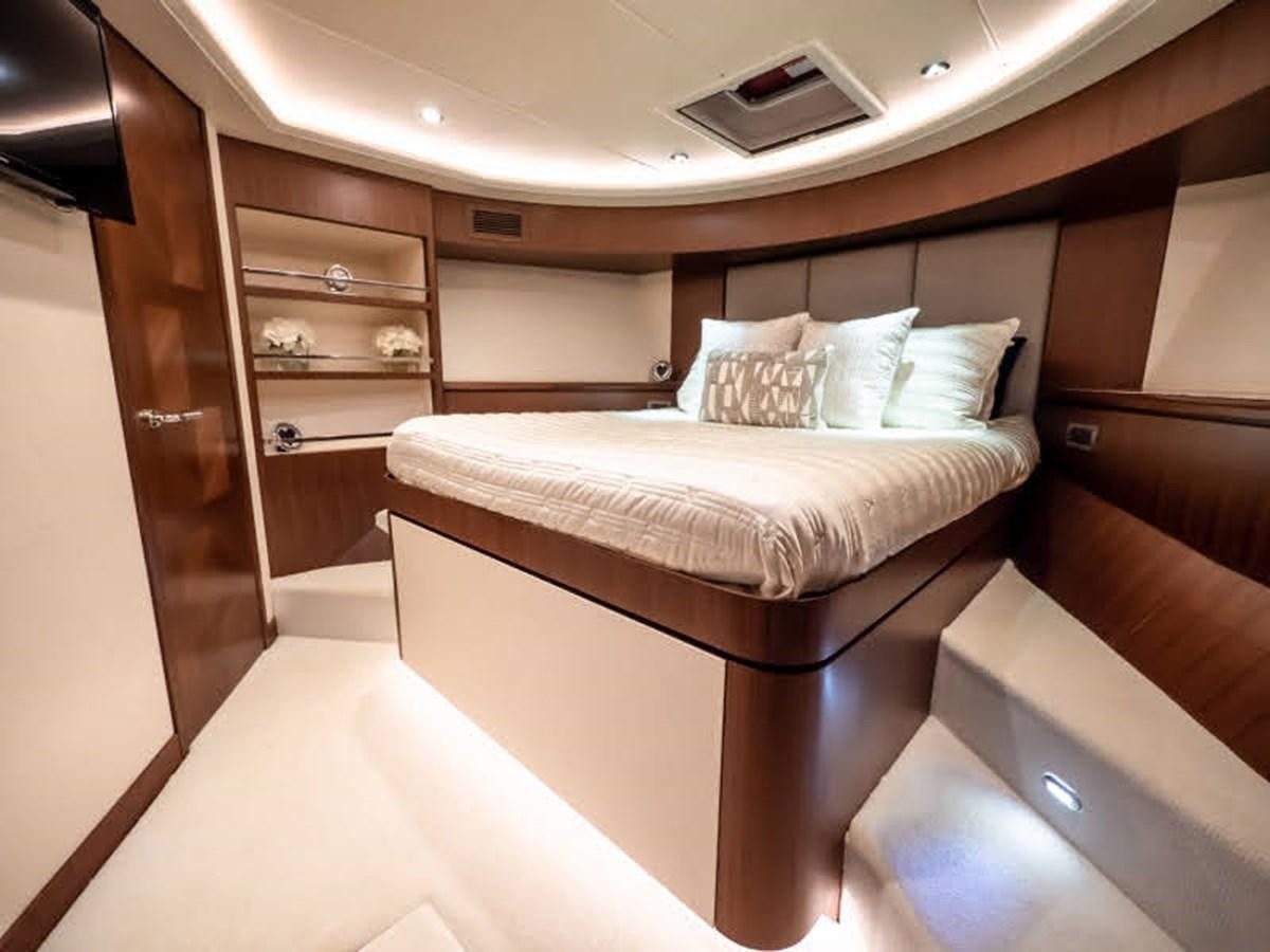 a bed in a room aboard PHOENIX Yacht for Sale
