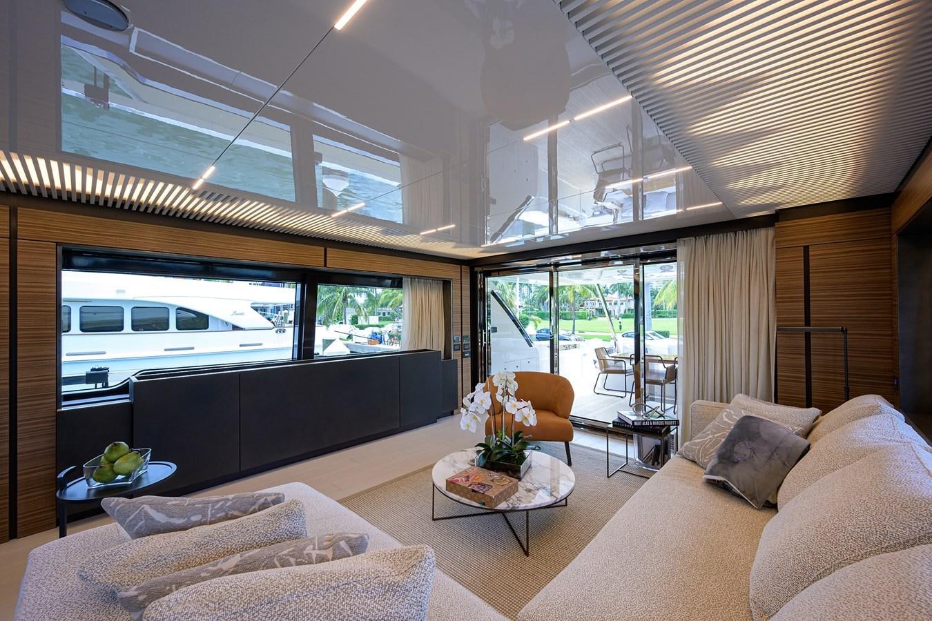 a living room with a large window aboard DATE NIGHT Yacht for Sale