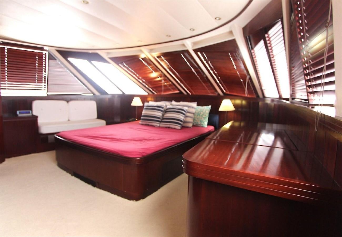 a room with a bed and a window aboard LURSSEN FBMY Yacht for Sale