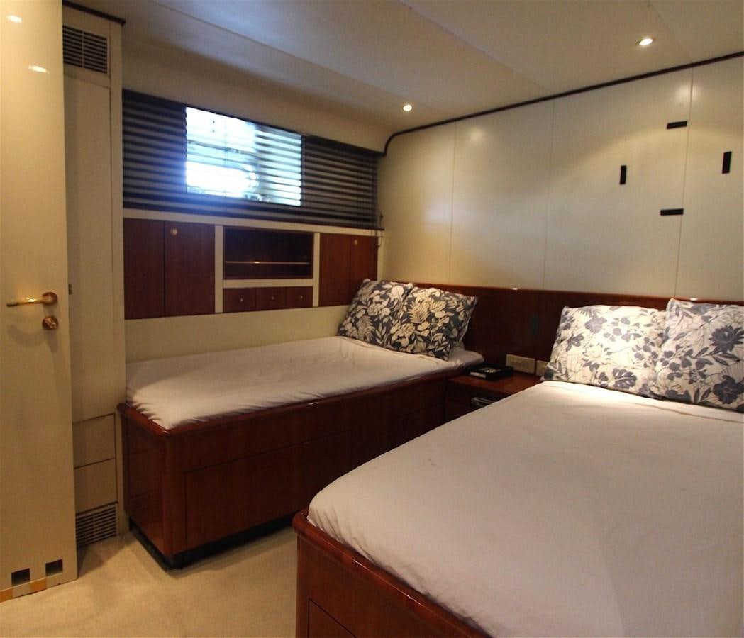 a couple of beds in a hotel room aboard LURSSEN FBMY Yacht for Sale