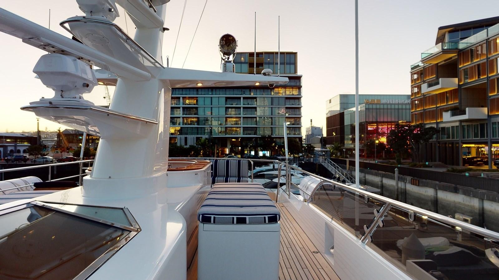 a large white building with a balcony aboard ADYTUM Yacht for Sale
