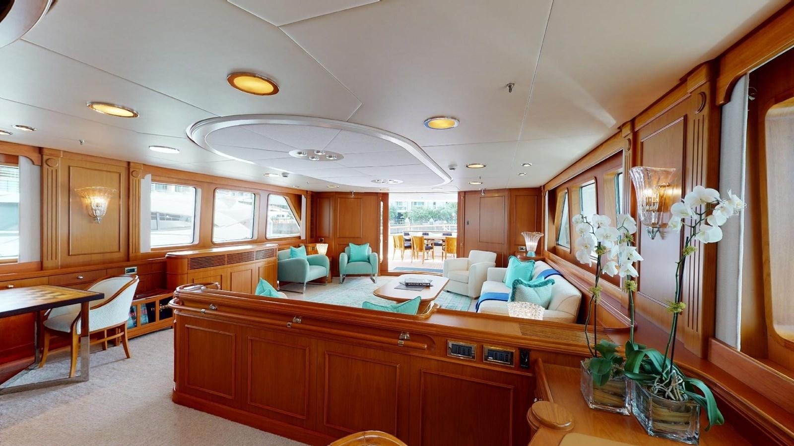 a large kitchen with a large island aboard ADYTUM Yacht for Sale