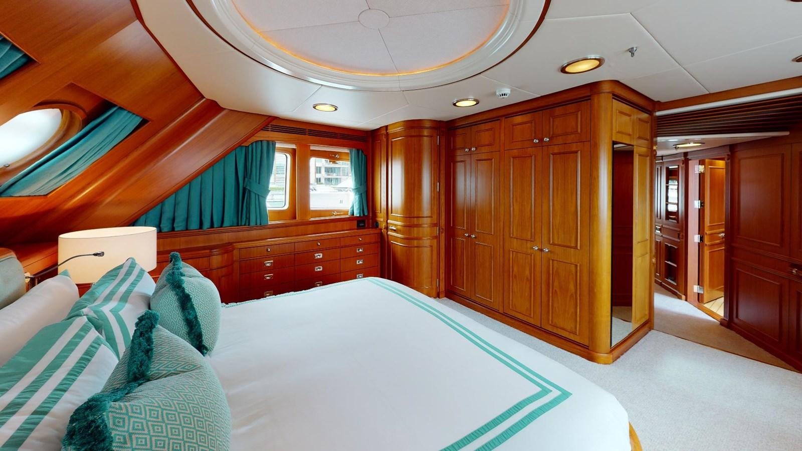 a bed in a room aboard ADYTUM Yacht for Sale