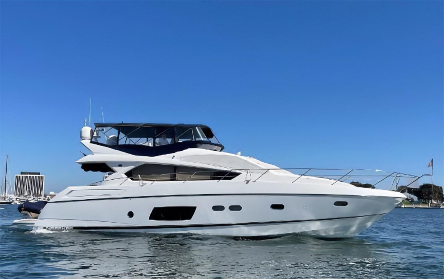 a white yacht in the water aboard GRACE ELLEN Yacht for Sale