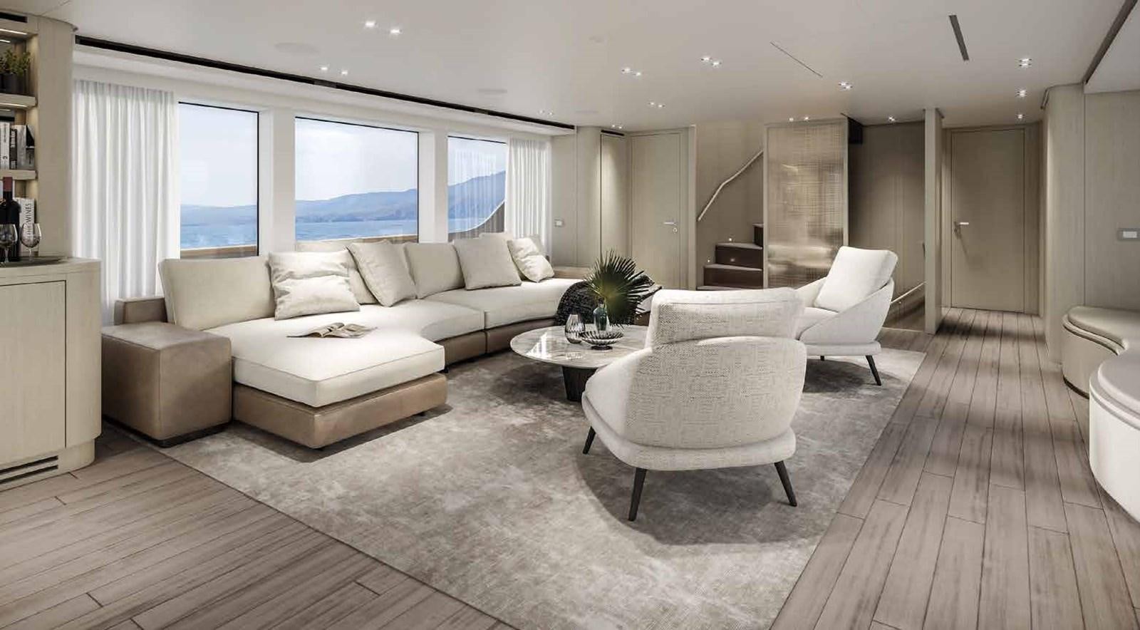 a living room with a couch and a table aboard AM Yacht for Sale