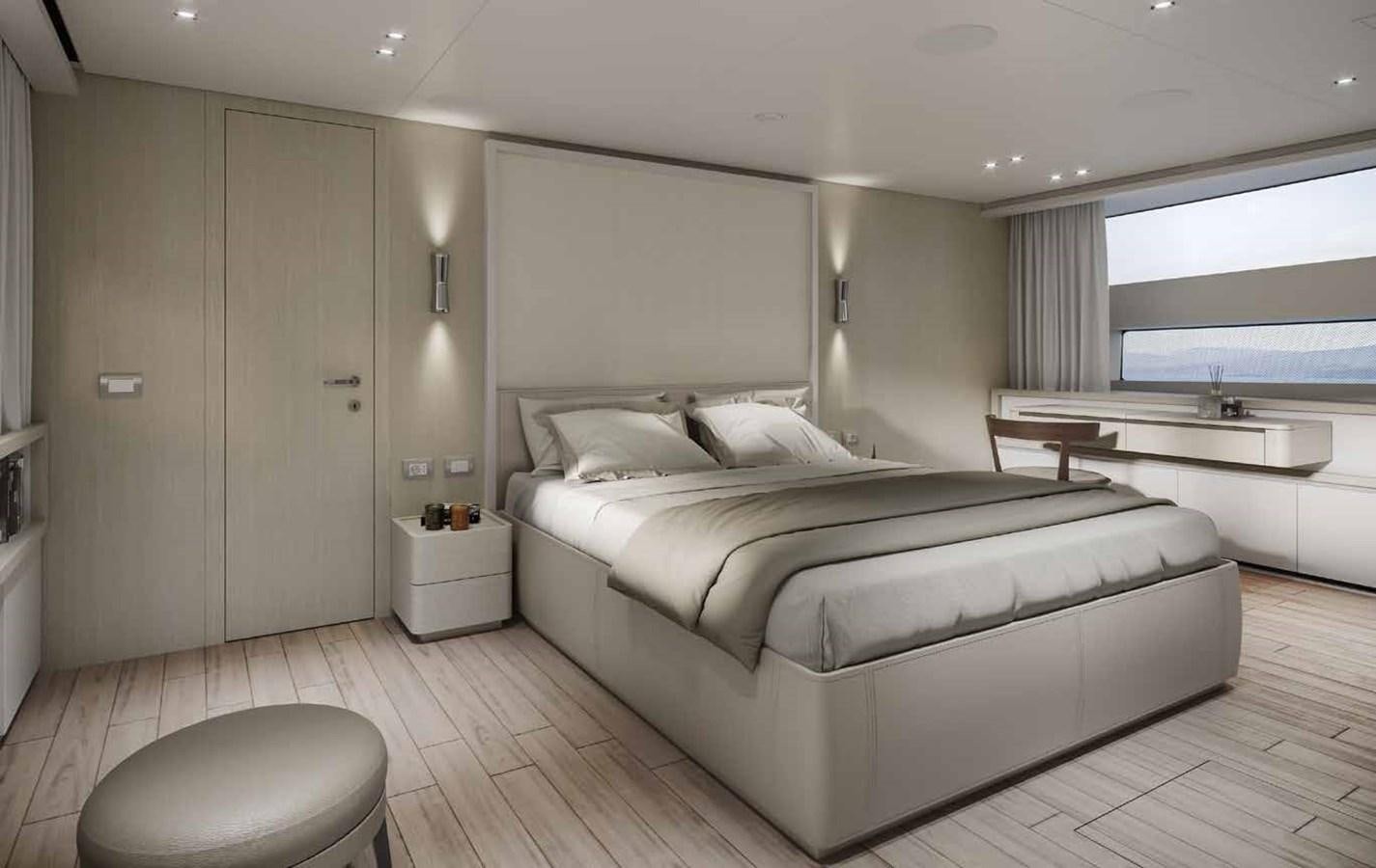a large white bed in a room aboard AM Yacht for Sale