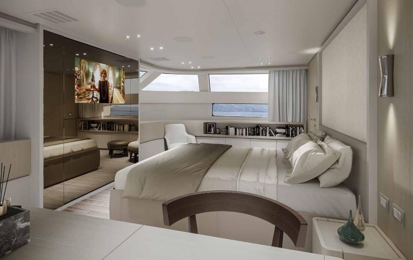 a room with a bed and a television aboard AM Yacht for Sale
