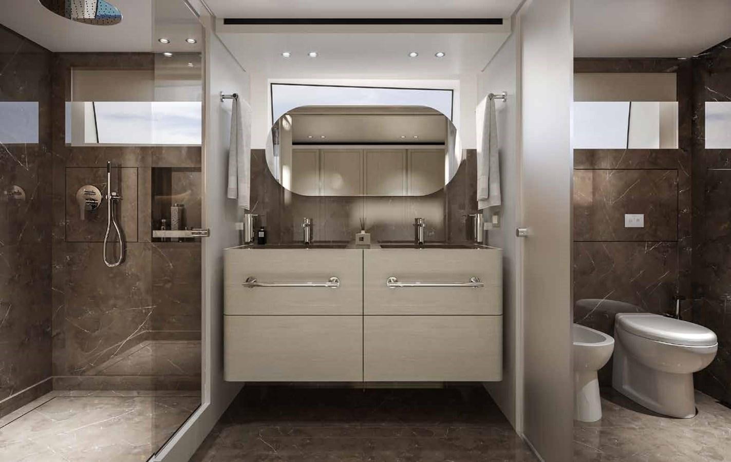 a bathroom with a toilet and sink aboard AM Yacht for Sale