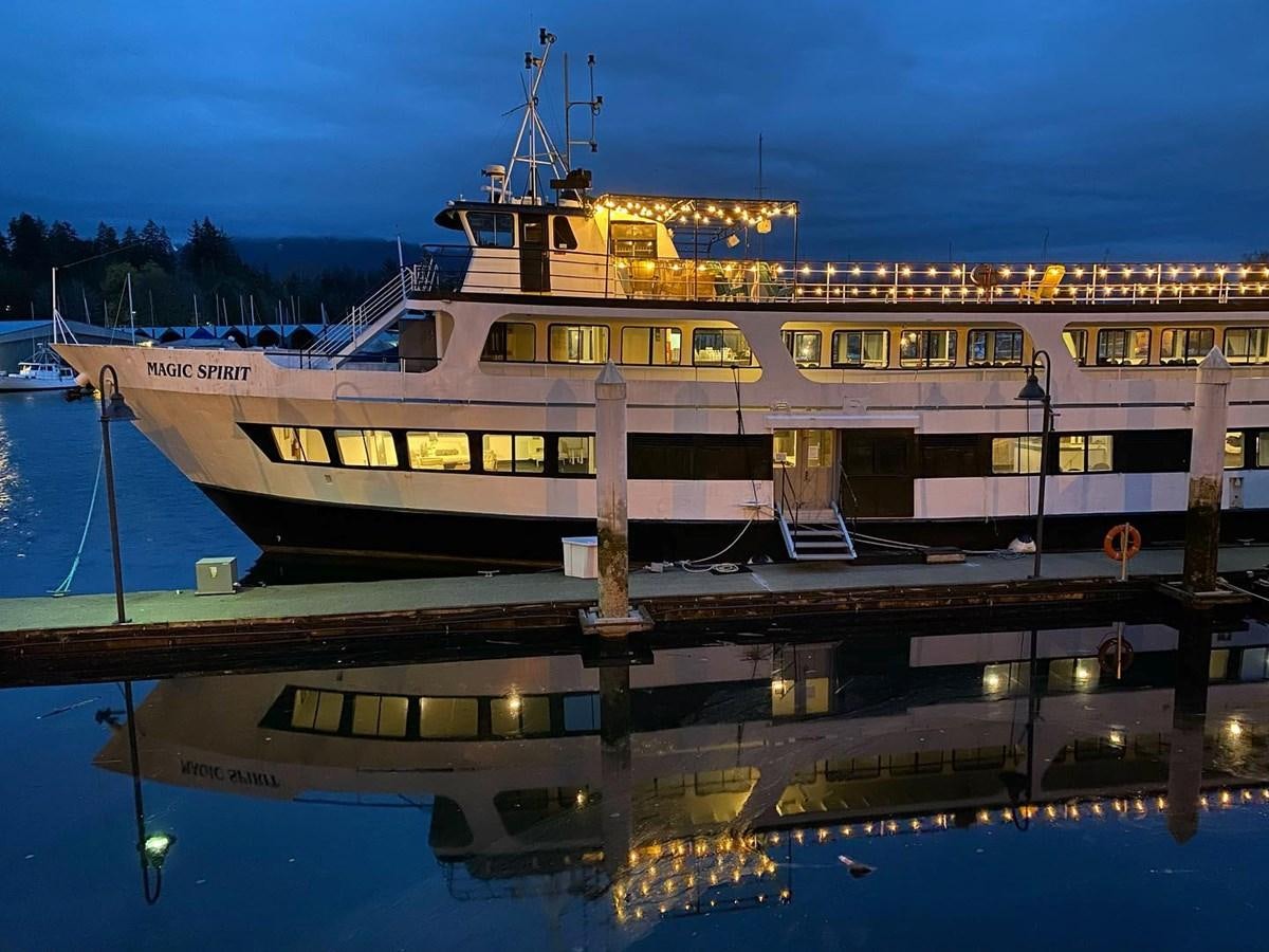 a large white boat on the water aboard MAGIC SPIRIT Yacht for Sale