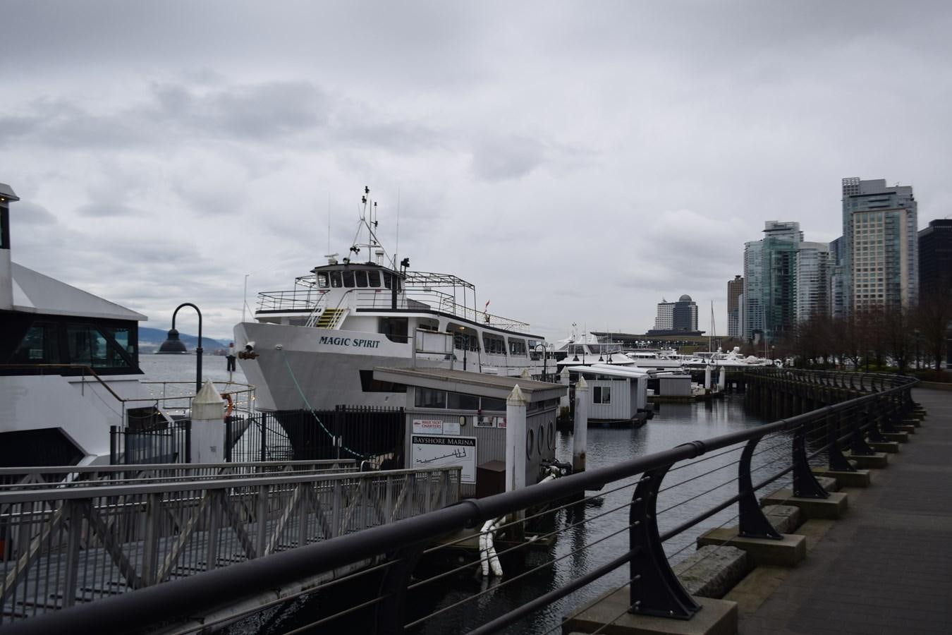 a dock with boats aboard MAGIC SPIRIT Yacht for Sale