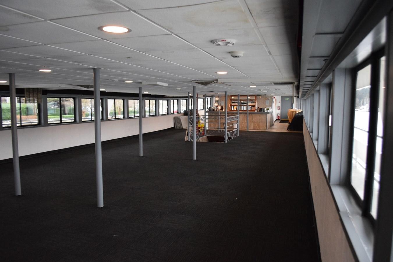 a hallway with a few doors aboard MAGIC SPIRIT Yacht for Sale