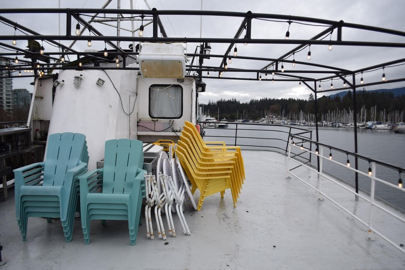 a group of chairs on a deck aboard MAGIC SPIRIT Yacht for Sale